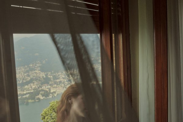 este-hotel-villa-lake-maggiore-chiara bonetti - lifestyle - portrait- woman - panoramic view - window